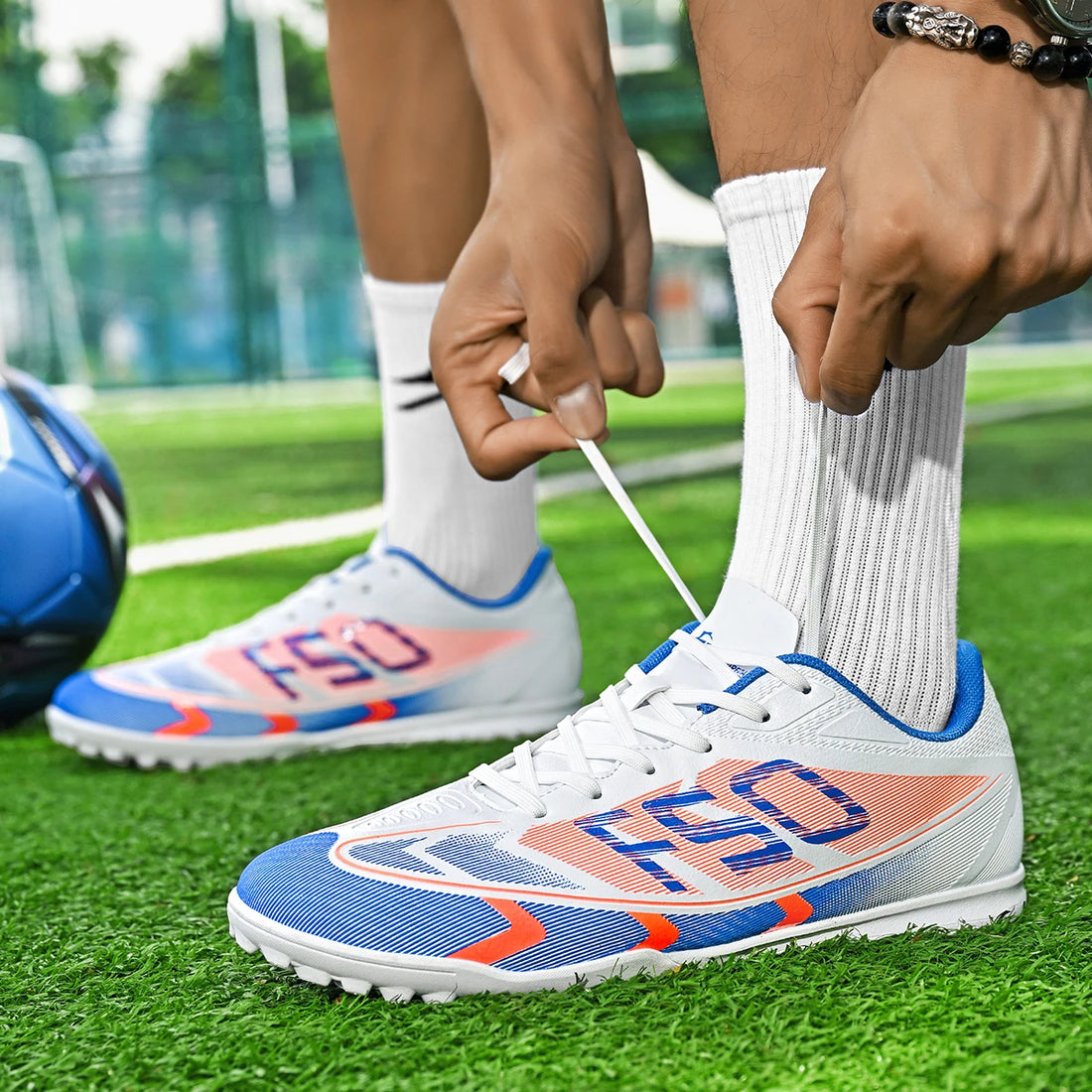 Soccer shoes, unisex style, comfortable, breathable, wear-resistant, available in TF and FG, two colors to choose from.